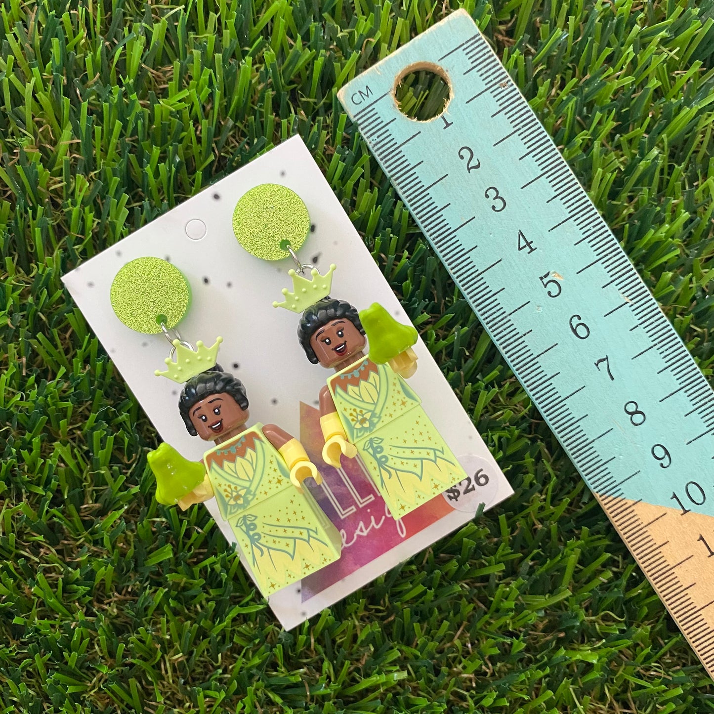 Green Dress Princess Brick Character Dangle Earrings - Featuring a Glittery Green Top and Frog Accessory!