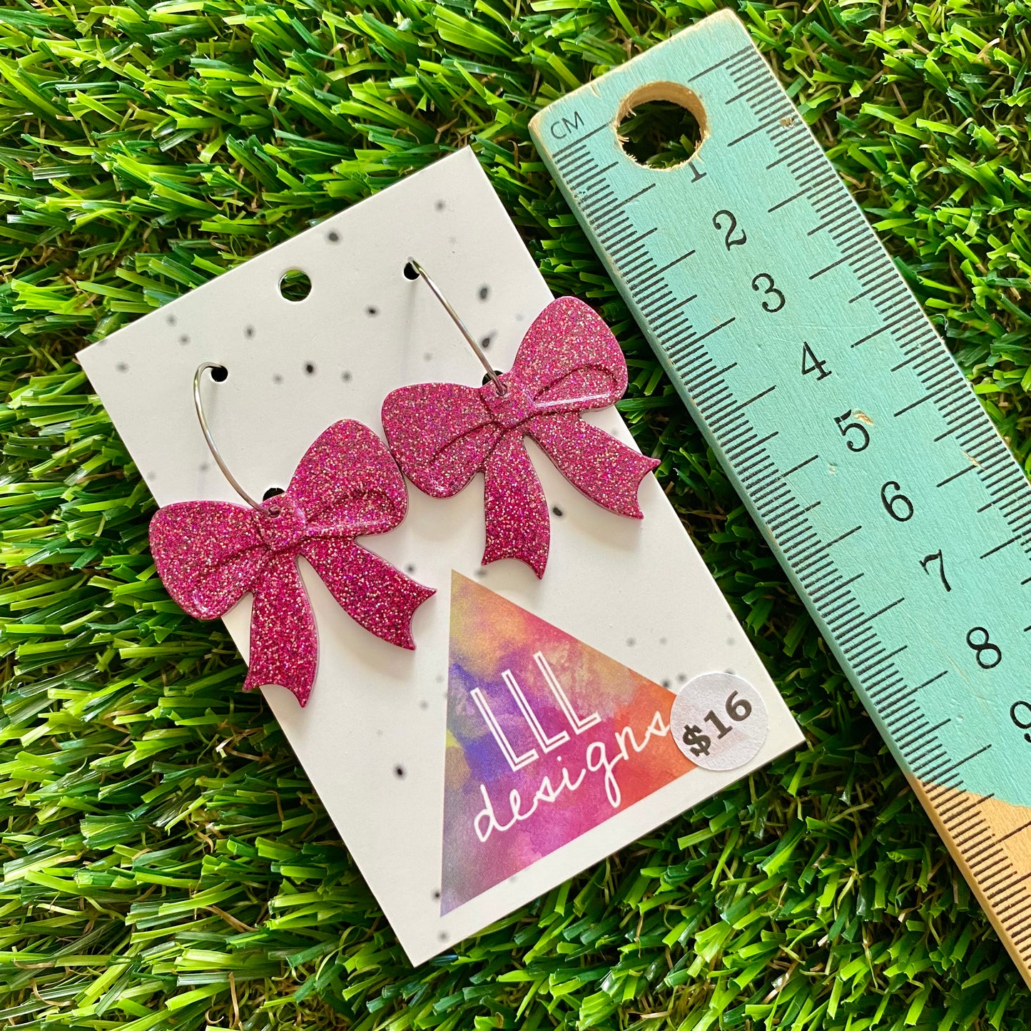 ON SALE!!!!!! Resin Earrings - Pink Glitter Bows Featuring a Silver Hoop!