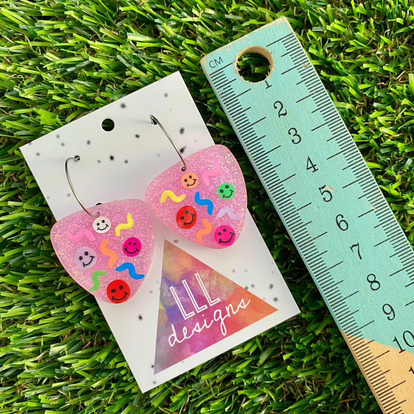 ON SALE!!!!! Resin Earrings - Glitter Pastel Pink Guitar Pick Hoops Featuring Hand Placed Rainbow Smiley Faces and Squiggles!