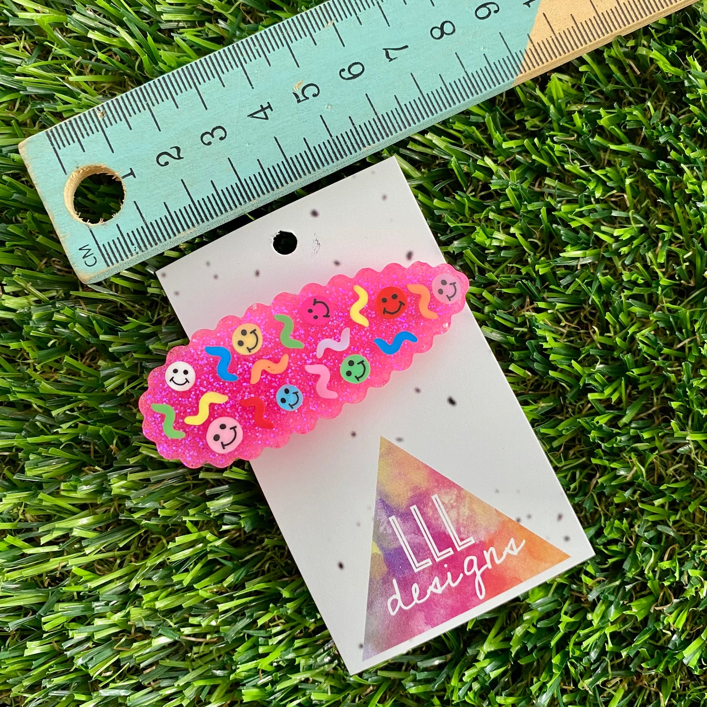 Handmade Resin Hair clip - Glitter Neon Pink Duel Layered Hair Clip Featuring Hand Placed Rainbow Smiley Face and Squiggles! (1)