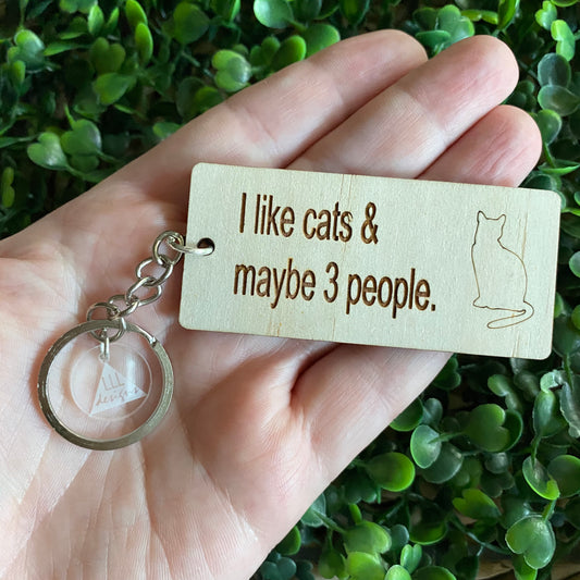 "I like cats & maybe 3 people" Quirky Timber Keyring - Laser Cut & Etched on Timber with Silvertone Hardware finished with a LLL Logo Tag.