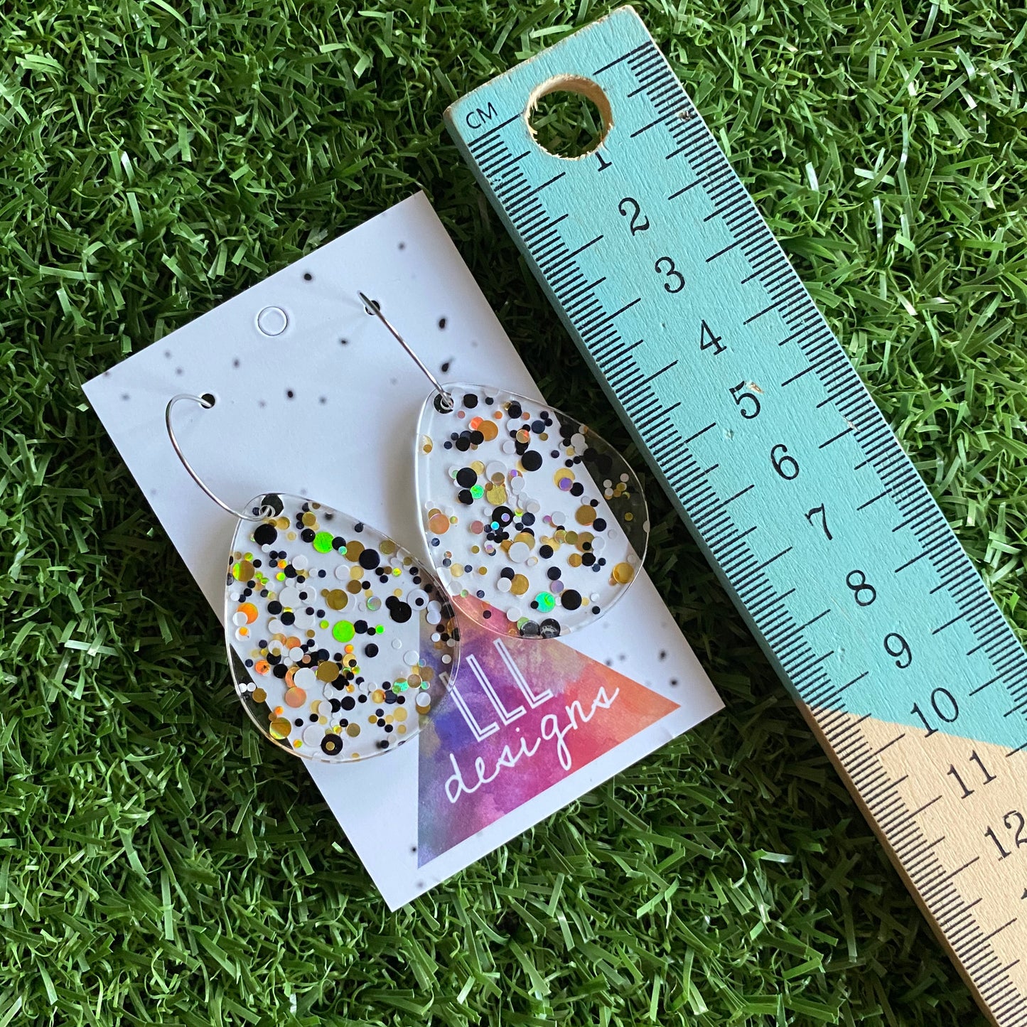 Stunning Clear Tear Drops featuring Polka Dot Confetti Scattered Throughout. Creating a beautiful visual effect. (Blk/White/Gold)