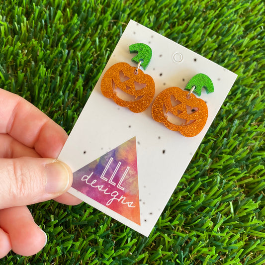 Pumpkin Earrings - Jack O Lantern Earrings - Glitter Orange Acrylic Jack O Lantern Dangles featuring Glitter Green Stem Tops. (Small)