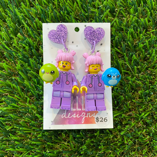 Pink Haired Cutie Brick Character With Purple Bunny Onesie Dangle Earrings With Plushies - Featuring Purple Glitter Heart Shaped Tops!