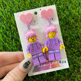 Pink Haired Cutie Brick Character With Purple Bunny Onesie Dangle Earrings - Featuring Pink Glitter Heart Shaped Tops!