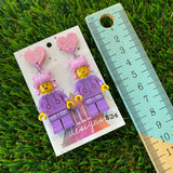 Pink Haired Cutie Brick Character With Purple Bunny Onesie Dangle Earrings - Featuring Pink Glitter Heart Shaped Tops!