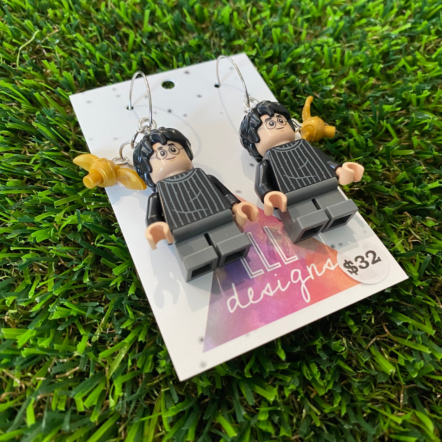 Competitive Wizard Boy Brick Character with Golden Winged Accessory Dangle Earrings - Featuring Surgical Stainless Steel Silver Hoops