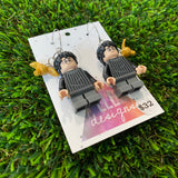 Competitive Wizard Boy Brick Character with Golden Winged Accessory Dangle Earrings - Featuring Surgical Stainless Steel Silver Hoops