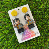 Uniformed Wizard Boy Brick Character with Wand Accessory Dangle Earrings - Featuring a Yellow Glitter Top!