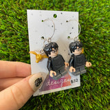 Competitive Wizard Boy Brick Character with Golden Winged Accessory Dangle Earrings - Featuring Surgical Stainless Steel Silver Hoops