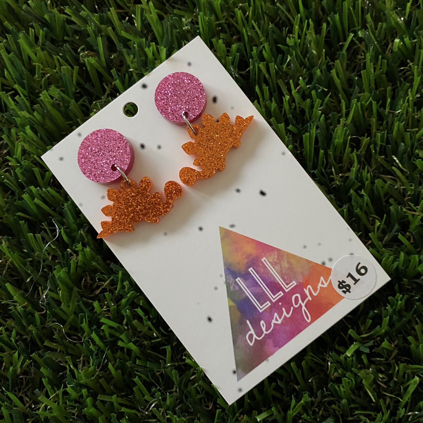 Dinosaur Earrings - Mini Glitter Orange Stegosaurus Dangles with Pink Glitter Studs - these are DINO-mite!