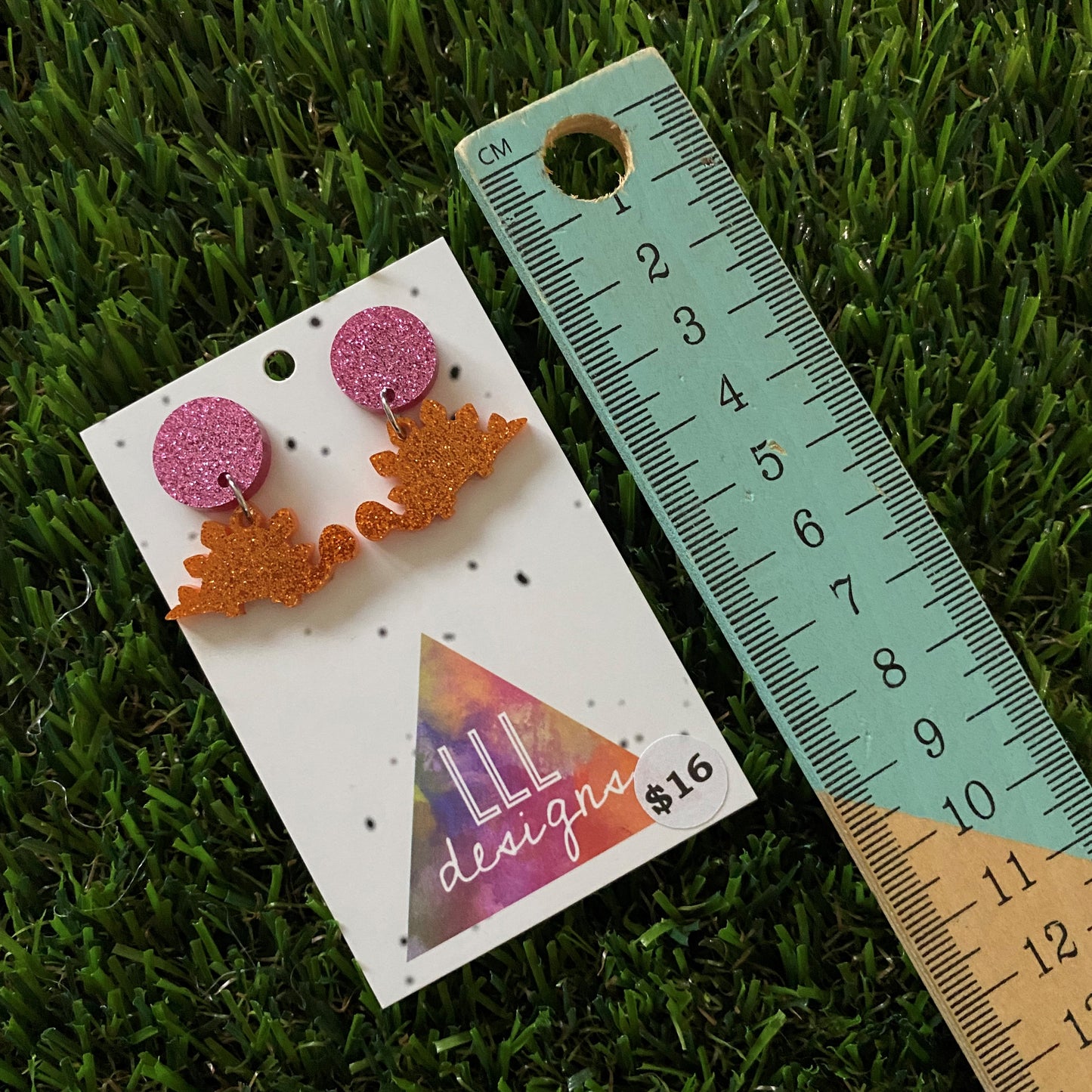 Dinosaur Earrings - Mini Glitter Orange Stegosaurus Dangles with Pink Glitter Studs - these are DINO-mite!
