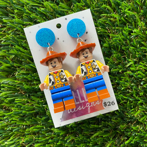 Cow Boy Brick Character Dangle Earrings - Featuring a Glittery Blue Top!