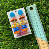 Cow Boy Brick Character Dangle Earrings - Featuring a Glittery Blue Top!