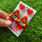 Red Caped Girl Brick Character Dangle Earrings - Featuring a Glittery Red Heart Shaped Top!