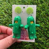 Cactus Girl Brick Character Dangle Earrings - Featuring a Glittery Green Top! Don't be a Prick LOL!