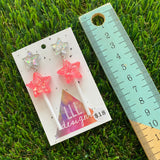 Bright Pink Iridescent Glitter Star Lollipop Dangle Earrings Featuring Silver Star Top!