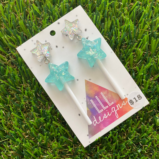 Sky Blue Iridescent Glitter Star Lollipop Dangle Earrings Featuring Silver Star Top!