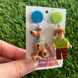 Mystery Duo Brick Character Dangle Earrings - Featuring Blue and Light Green Glittery Top!