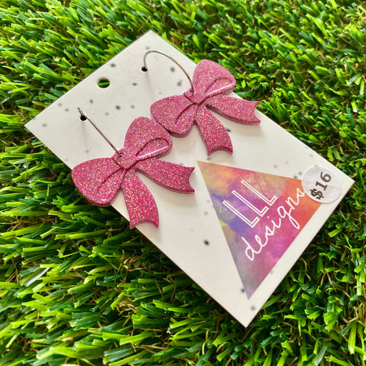 ON SALE!!!!!! Resin Earrings - Pink Glitter Bows Featuring a Silver Hoop!