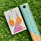 Resin Earrings - Orange Multi Glitter Oval Disk Featuring a Hook Top!