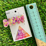 Handmade Resin Hair Clip - Yellow, Pink, Violet Glitter Squiggle Hair Clip Featuring a Pink Bow!