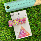 Handmade Resin Hair Clip - Yellow, Pink, Violet Glitter Squiggle Hair Clip Featuring a Pink Bow!