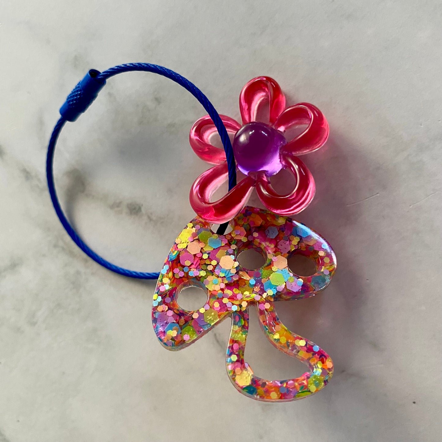 Resin Keyring / Bagtag - Dark Blue cable featuring Purple & Pink Daisy and Rainbow Confetti Mushroom! (12)