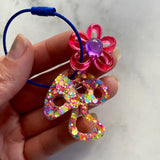 Resin Keyring / Bagtag - Dark Blue cable featuring Purple & Pink Daisy and Rainbow Confetti Mushroom! (12)