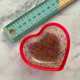 Resin Heart Dish - Two Tone Rainbow Confetti featuring a Rainbow Confetti Base and Bright Pink Border! Brighten Up Your Life with this Bold and Fun Piece!