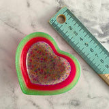 Resin Heart Dish - Three Tone Rainbow Confetti featuring a Rainbow Confetti Base, Bright Pink Middle and Green Border! Brighten Up Your Life with this Bold and Fun Piece!