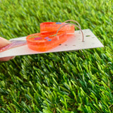 Resin Earrings - Glitter Neon Orange Guitar Pick Hoops Featuring Hand Placed Rainbow Smiley Faces and Squiggles!