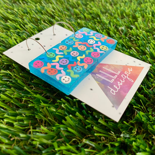 ON SALE!!!! Resin Earrings - Glitter Blue Square Hoops Featuring Hand Placed Rainbow Smiley Faces and Squiggles!