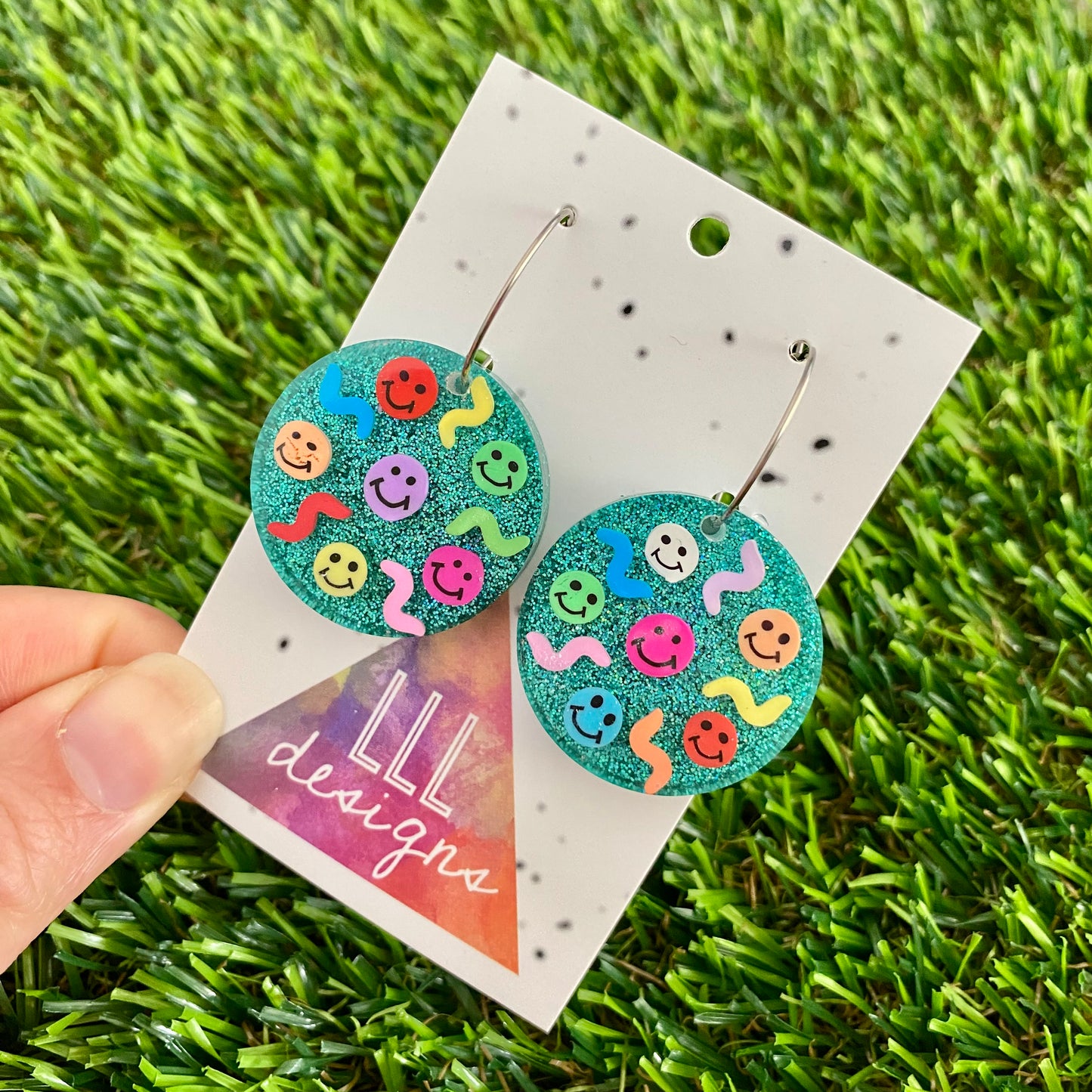 ON SALE!!!! Resin Earrings - Glitter Teal Circle Hoops Featuring Hand Placed Rainbow Smiley Faces and Squiggles!
