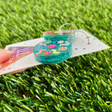 Resin Earrings - Glitter Teal Circle Hoops Featuring Hand Placed Rainbow Smiley Faces and Squiggles!