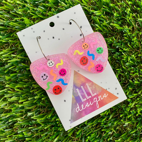 Resin Earrings - Glitter Pastel Pink Guitar Pick Hoops Featuring Hand Placed Rainbow Smiley Faces and Squiggles!