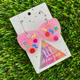 Resin Earrings - Glitter Pastel Pink Guitar Pick Hoops Featuring Hand Placed Rainbow Smiley Faces and Squiggles!