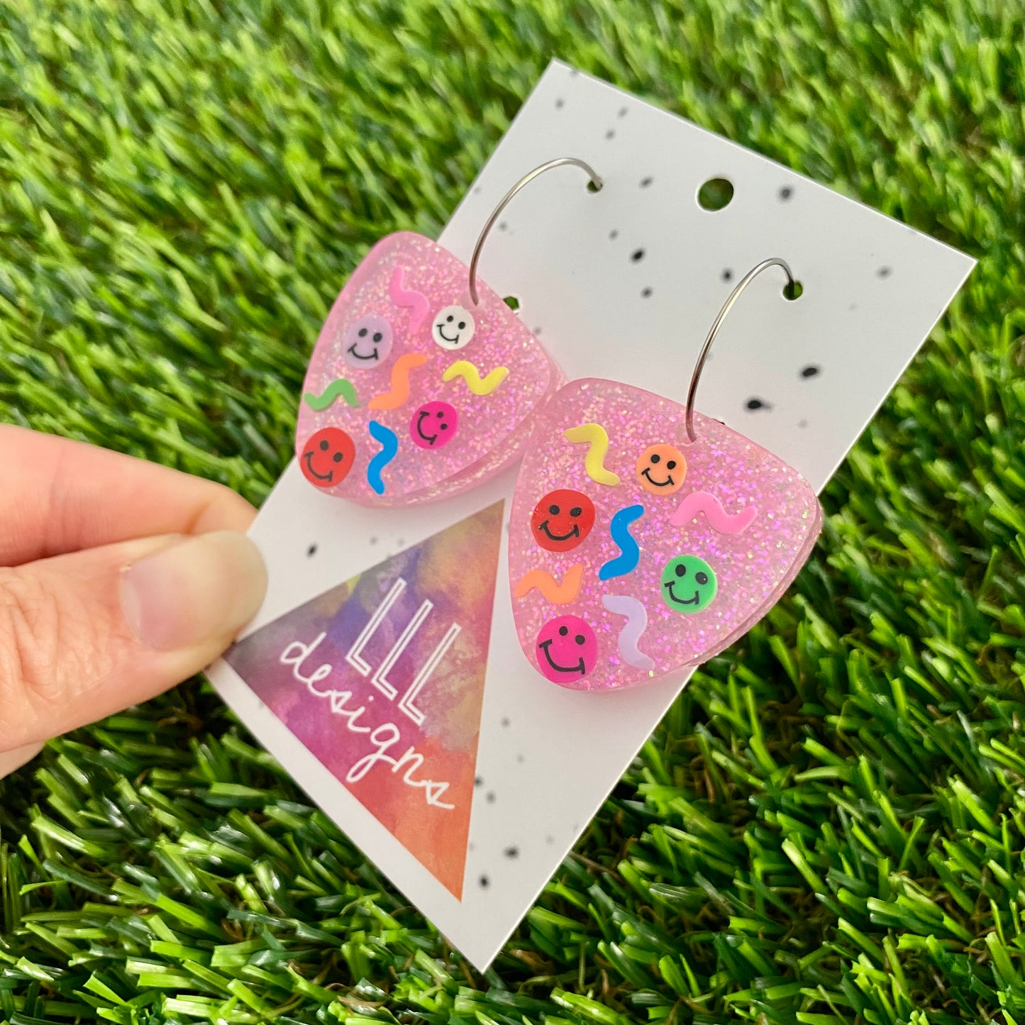 ON SALE!!!!! Resin Earrings - Glitter Pastel Pink Guitar Pick Hoops Featuring Hand Placed Rainbow Smiley Faces and Squiggles!