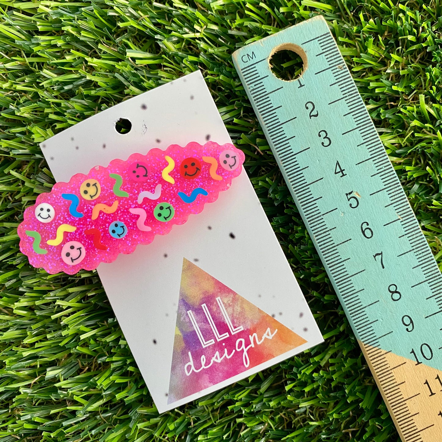 Handmade Resin Hair clip - Glitter Neon Pink Duel Layered Hair Clip Featuring Hand Placed Rainbow Smiley Face and Squiggles! (1)