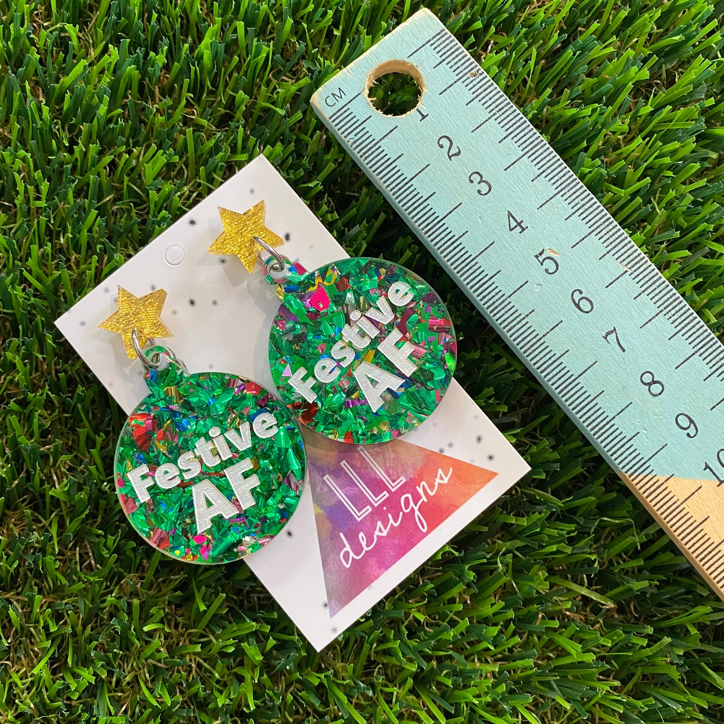 Festive AF Statement Dangle Earrings in Green Tone and Rainbow Glitter Featuring Gold Star Tops.