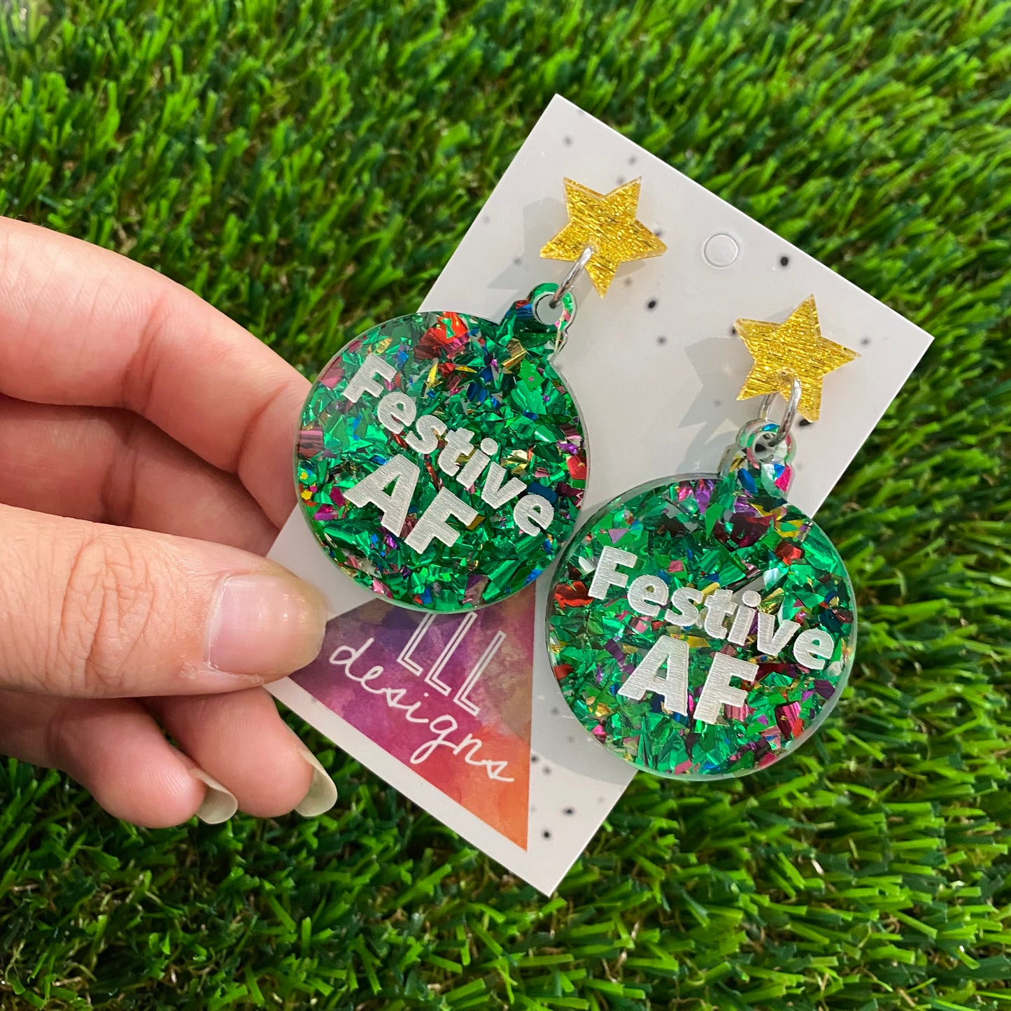 Festive AF Statement Dangle Earrings in Green Tone and Rainbow Glitter Featuring Gold Star Tops.