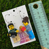 Christmas Gift Partners Brick Earrings- Seasonal Couple with Camera and Present Dangle Earrings, Featured on Surgical Stainless Steel Hoops.