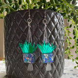 Hanging Planter Dangle Earrings. Featuring Stunning Blue and Silver Holographic Planters hanging from Surgical Stainless Steel Hooks.