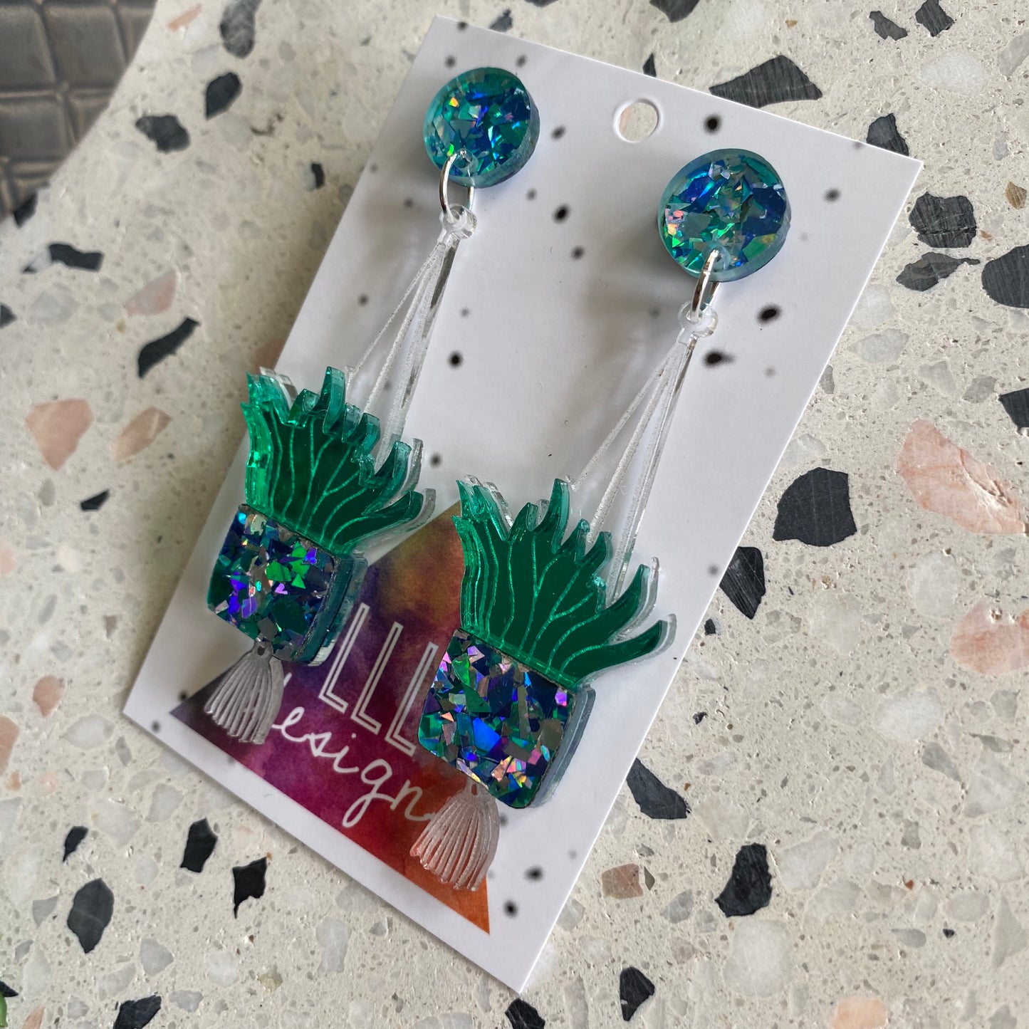 Hanging Planter Dangle Earrings. Featuring Stunning Blue and Silver Holographic Planters along with matching circular tops.