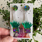 Hanging Planter Dangle Earrings. Featuring Stunning Purple and Green Holographic Planters Hung from Matching Circular Tops.