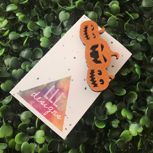 Layered Acrylic Scary Pumpkin Patch Brooch. Made is Vibrant Orange Glitter. Jack O'Lantern Brooch.