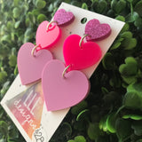 Pretty in Pink Love Heart Trio Dangle Statement Earrings. These Babes are Perfection in Pink! Featuring 3 Fabulous shades of Pink Acrylic.