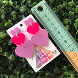 Pretty in Pink Love Heart Trio Dangle Statement Earrings. These Babes are Perfection in Pink! Featuring 3 Fabulous shades of Pink Acrylic.