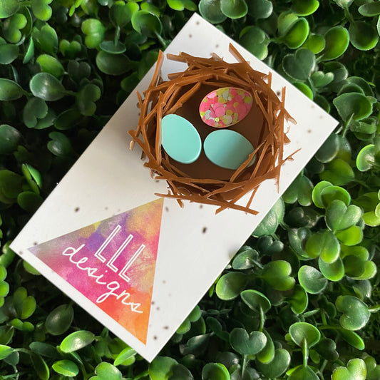 Easter Brooch. Birds Nest Brooch - Featuring 2 Matte Pastel Mint and 1 Colourful Speckled Eggs, set in a nest made of 3 layers of intricately cut acrylic.