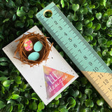 Easter Brooch. Birds Nest Brooch - Featuring 2 Matte Pastel Mint and 1 Colourful Speckled Eggs, set in a nest made of 3 layers of intricately cut acrylic.